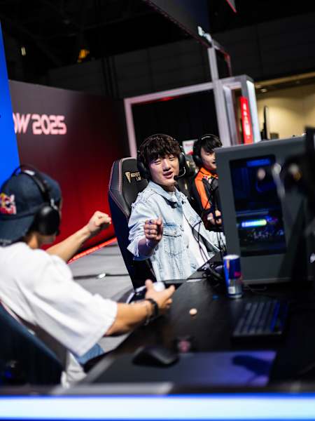 iiTzTimmy congratulates Yuki Tsunoda at a game during the Tokyo Game Show 2025 in Japan.