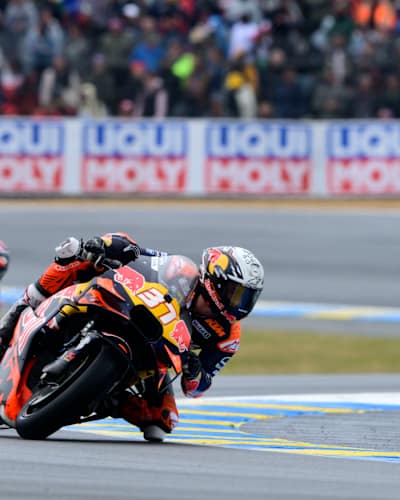 Pedro Acosta leans into a corner on his Red Bull KTM Factory Racing bike during Stop 06 of the MotoGP World Championship at Le Mans, France, on May 12, 2025