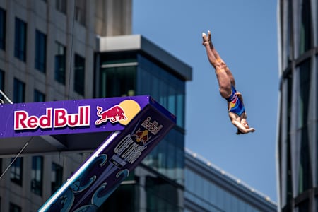 Molly Carlson dives from the 21 metre platform during the Red Bull Cliff Diving World Series in Boston, USA