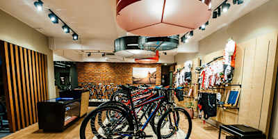 Bike shop with mountain bikes and clothing.