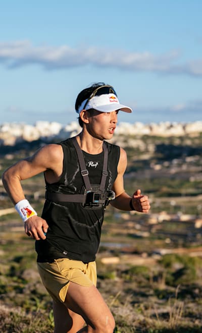 Ruy Ueda performs during Running the Length of an Entire Country project in Malta on February 1, 2023.