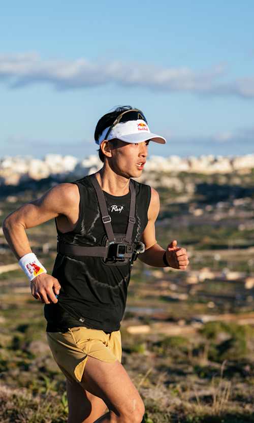 Ruy Ueda performs during Running the Length of an Entire Country project in Malta on February 1, 2023.