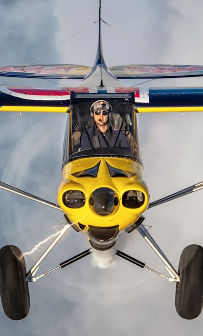 Łukasz Czepiela flies in Carbon Cub EX2 plane during the Air-to-Air Meeting in Piotrkow Trybunalski, Poland on May 7, 2021.