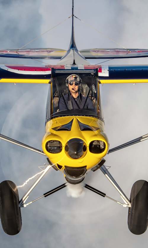 Łukasz Czepiela flies in Carbon Cub EX2 plane during the Air-to-Air Meeting in Piotrkow Trybunalski, Poland on May 7, 2021.