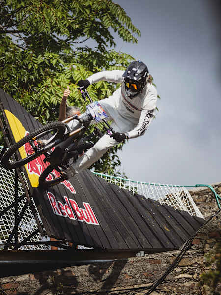Hannes Alber takes on an epic wallride during Red Bull Cerro Abajo at Teatro Nazionale Genova, Italy, showing off gravity-defying skills needed to conquer the course