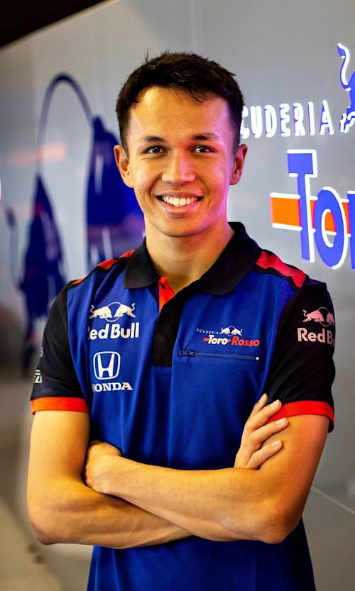 A portrait of Alexander Albon, signed as a Formula One driver for Scuderia Toro Rosso for 2019.