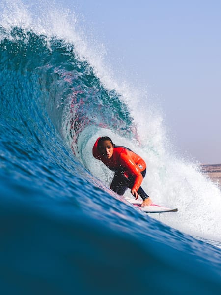Carissa Moore does a layback while surfing in Morocco.