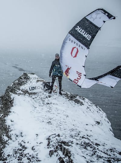 Ruben Lenten stands on a snowing outcrop in Iceland