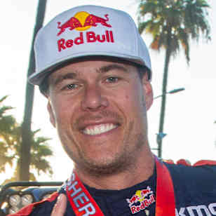Bryce Menzies, with co-drivers Andy McMillin and Tavo Vildosola celebrating their 2023 Baja 1000 win.