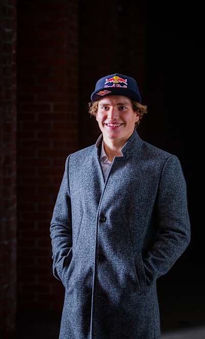 Žiga Lin Hočevar smiles with Red Bull cap in 2024.