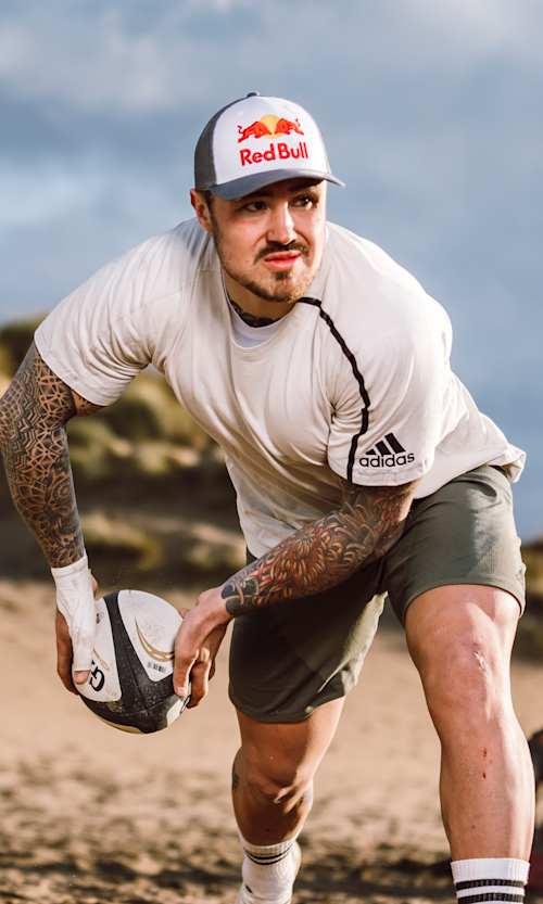 Jack Nowell seen during the shoot of Red Bull Pro at Holywell Beach, United Kingdom on December 17, 2019.