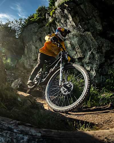Thomas Genon tackles a technical rocky section at Red Bull Hardline in Dinas Mawddwy, United Kingdom, on June 2, 2024
