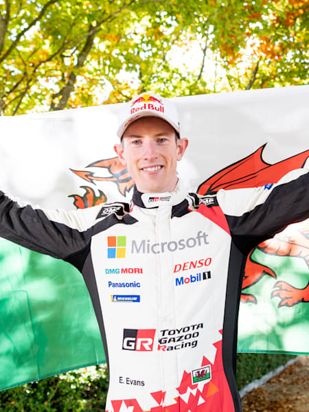 Elfyn Evans poses for a portrait holding the Welsh flag at Goodwood Speed Week near Chichester, UK on October 16, 2020.