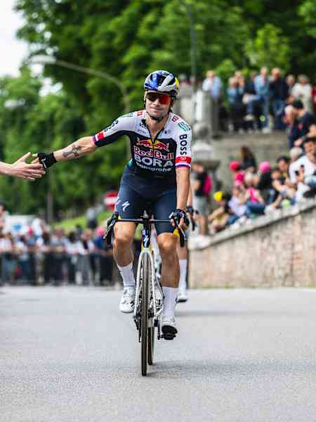 Primož Roglič of Red Bull - BORA - hansgrohe connects with fans during the Giro d'Italia in Treviso, Italy, on May 24, 2025.
