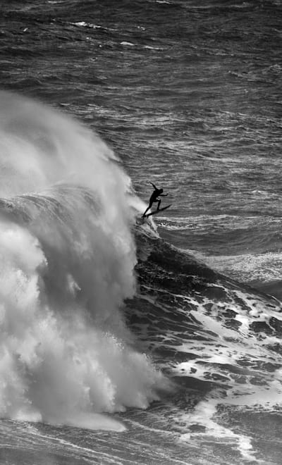 Lucas Chianca surfs in Nazaré, Portugal on December 8, 2021.