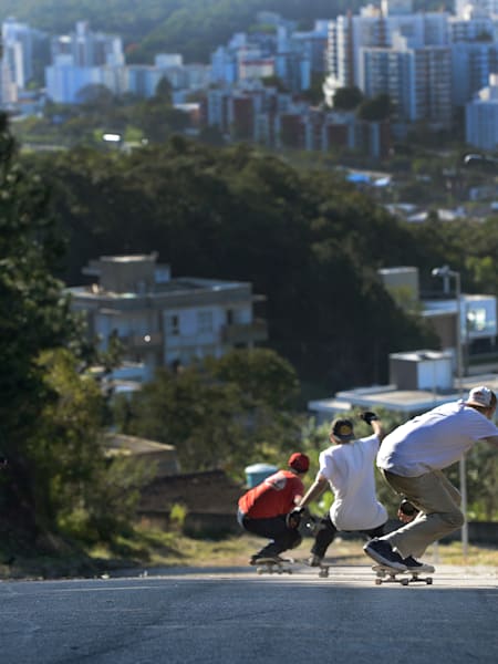 Skaters cruising downhill