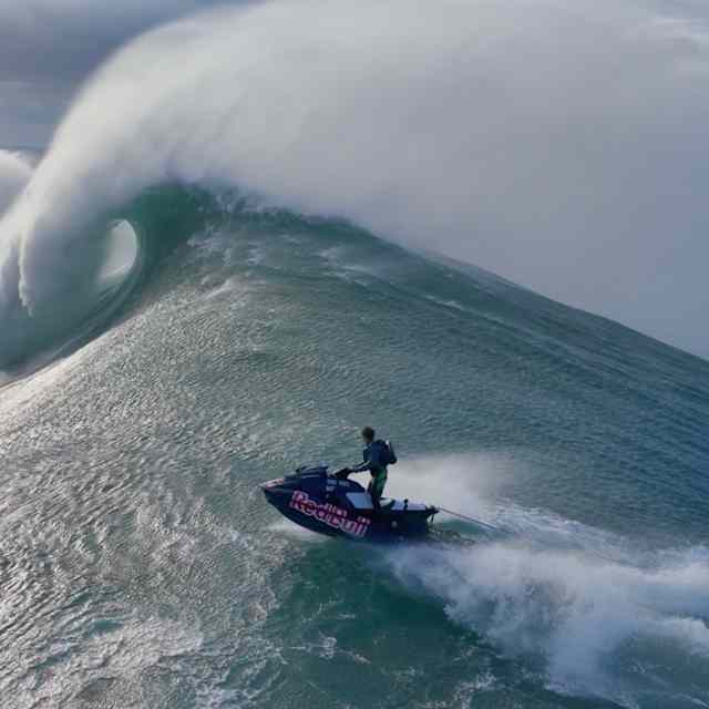 In 2024, Lucas Chianca surfs a massive wave in Nazaré, Portugal