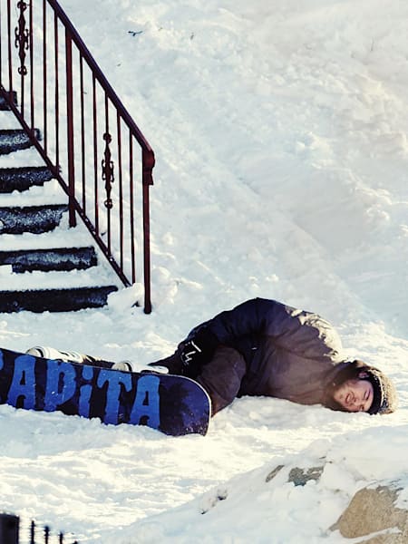 Snowboarder Johnny O’Connor after a crash landing