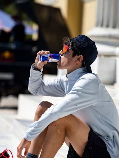 A participant drinking during the Wings for Life World Run App Run Event in Athens, Greece, on May 7, 2023.