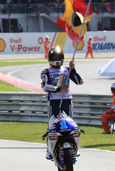 Jorge Martin celebrates winning the Moto3 world title at the Malaysian MotoGP on November 4, 2018.