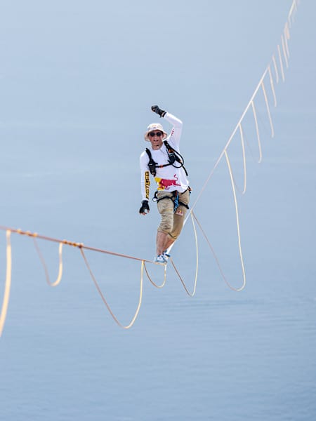 Jaan Roose balances on a 1.9cm slackline in Italy as he attempts to cross the Messina Strait 