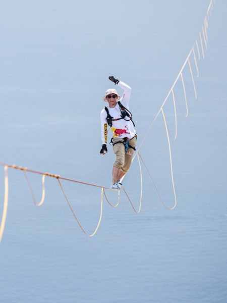 Jaan Roose balances on a 1.9cm slackline in Italy as he attempts to cross the Messina Strait 
