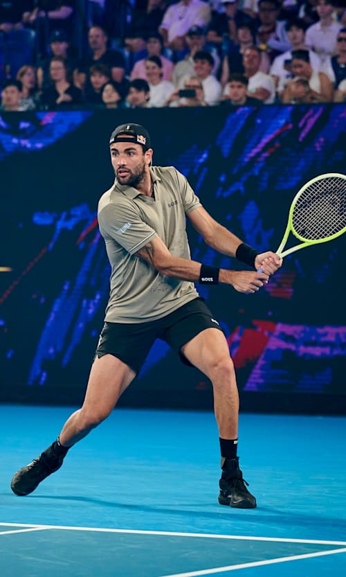 Matteo Berrettini unleashes a powerful backhand during the electrifying Red Bull Bassline tennis event in Melbourne, Australia on January 7, 2025