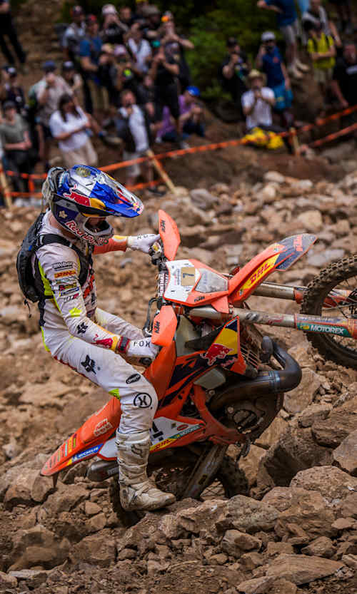 Manuel Lettenbichler powers his Red Bull KTM up a rocky climb during the thrilling Red Bull Erzbergrodeo 2025 event in Eisenerz, Austria, captivating fans with an epic display of Hard Enduro skill