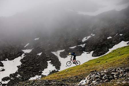 A rider competes at the fourth stop of the 2018 Enduro World Series in La Thuile, Italy.