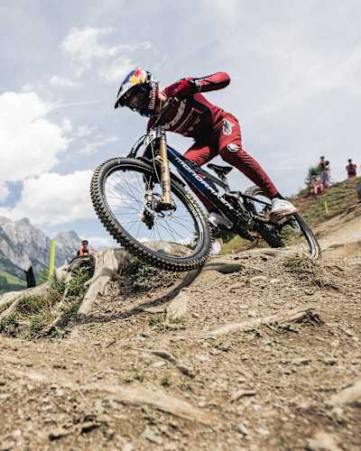 Ronan Dunne competes at the UCI Downhill World Cup 2024 event at Leogang in the scenic Austrian Alps