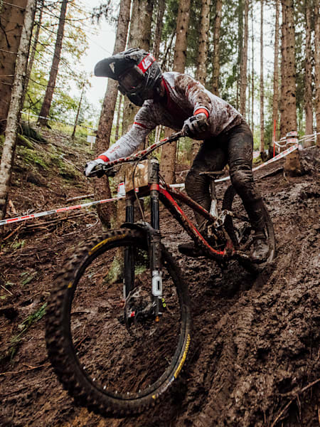 Competitor rides at the UCI Mountain Bike Downhill World Champs in Leogang, Austria on October 11, 2020.