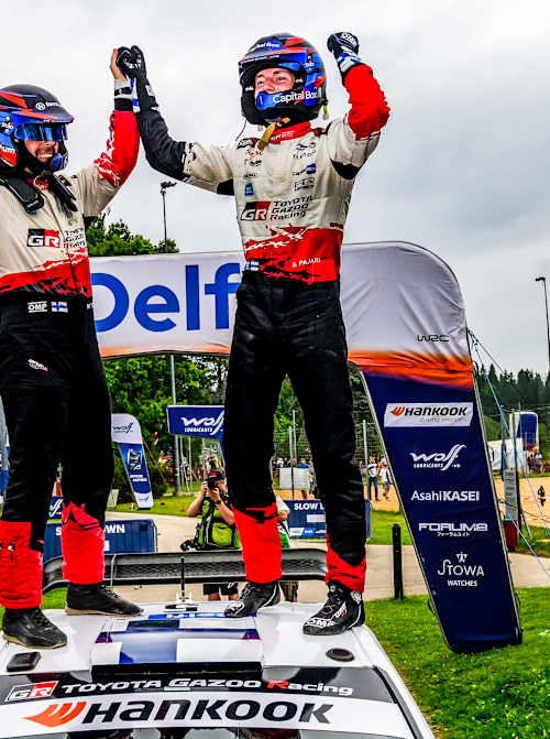 Sami Pajari celebrates a maiden WRC victory