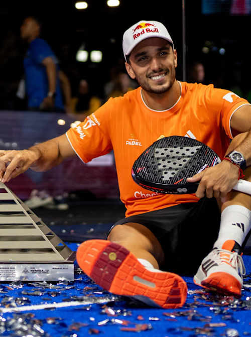 Federico Chingotto and Alejandro Galan pose with their winner trophies at the Newgiza Premier Padel P2 in Giza, Egypt. 