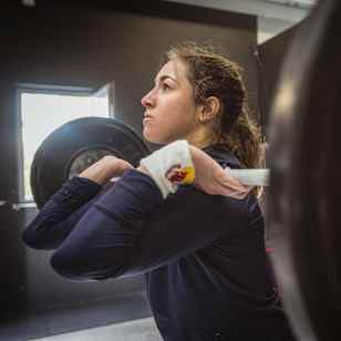 A portrait of Italian World Cup alpine ski racer Sofia Goggia in the gym.