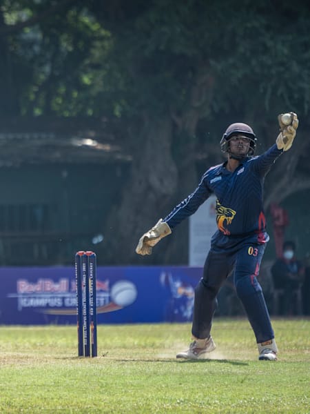 Cricket players participate in a match at Red Bull Campus Cricket.