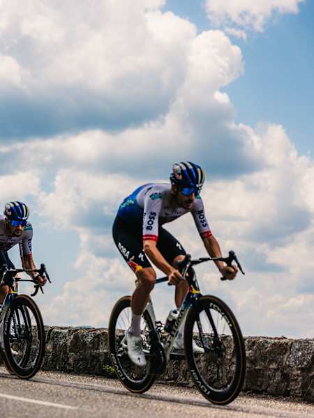  Red Bull – BORA – hansgrohe riders Remco Evenepoel, Jan Tratnik, Nico Denz, Maxim Van Gils, Florian Lipowitz and Tim van Dijke race through France on Stage 14 of the Tour de France.