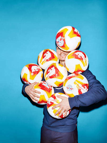 Marcel Sabitzer juggles with balls during a photoshoot for The Red Bulletin.