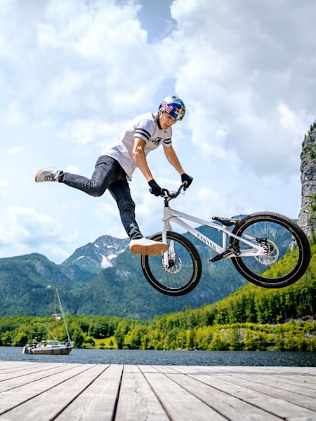 Fabio Wibmer performs tricks during a photoshoot for The Red Bulletin at Lake Hallstatt, Austria.