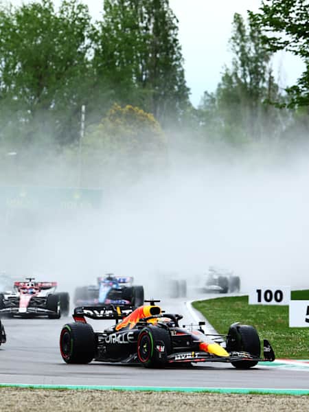 Max Verstappen leads Sergio Perez and the rest of the field into turn one at the start during the F1 Grand Prix of Emilia Romagna at Autodromo Enzo e Dino Ferrari on April 24, 2022.