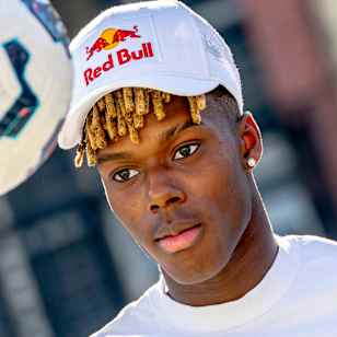In Bilbao, Spain, Nico Williams is seen sporting a Red Bull cap and performing freestyle football skills in 2025, capturing the brand’s adventurous energy