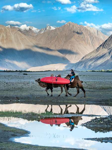 Kayaker Nouria Newman treks on camelback to begin her solo journey through Ladakh, India.