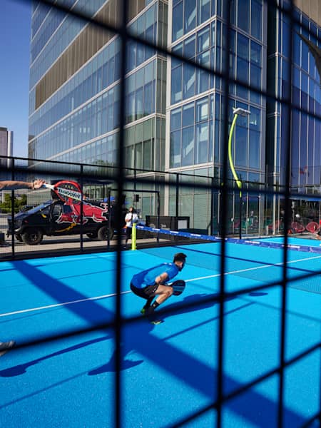 Play paddle, the newest sport, on an outdoor or indoor court in