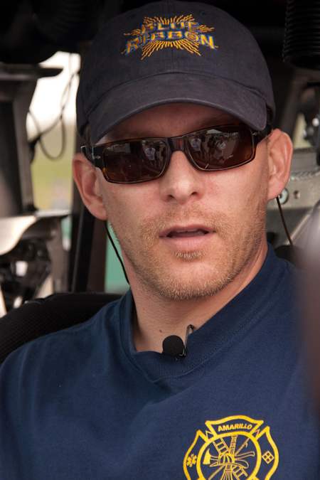 Ronan P. Nagle poses for a photo inside his Tornado Intercept Vehicle.