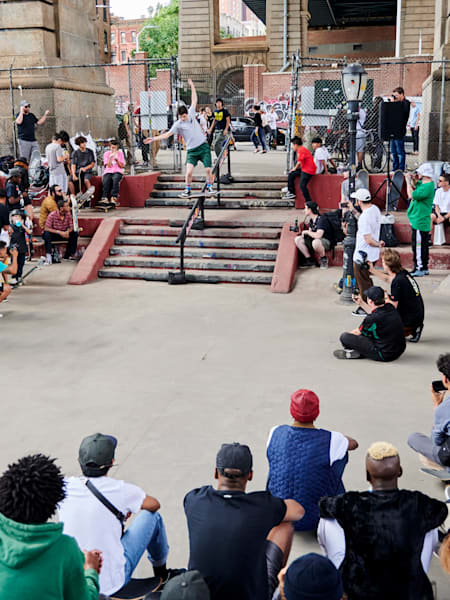 A best trick contestant performs a boardslide for spectators at a demo in New York City on June 22nd, 2019.