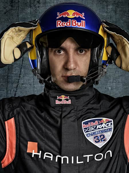 Challenger pilot Dario Costa of Italy poses for a photograph at the first round of the Red Bull Air Race World Championship in Abu Dhabi, United Arab Emirates on January 26, 2018.