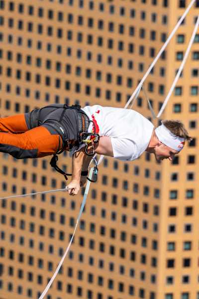 Jaan Roose performs a trick on a slackline above Seoul.