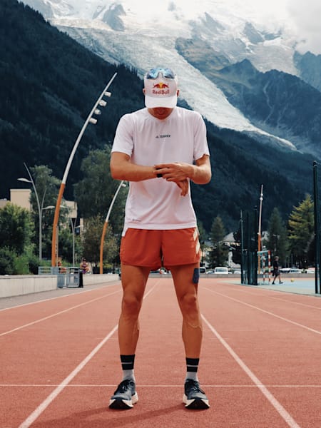 Ultrarunner Tom Evans on a running track in Chamonix during UTMB 2022