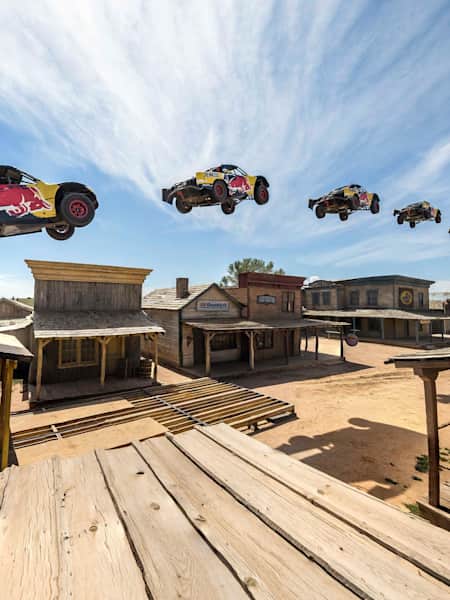Bryce Menzies jumps a ghost town in his Pro2 truck.