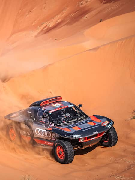 Carlos Sainz (ESP) and Lucas Cruz (ESP) of Team Audi Sport race during Stage 6 of Rally Dakar 2024 in Shubaytah, Saudi Arabia on January 11, 2024. 