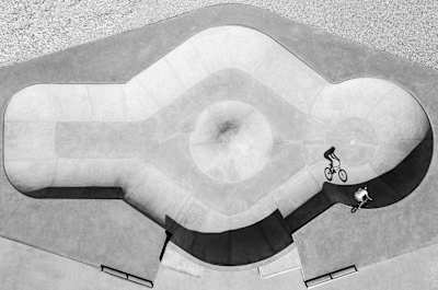 Baptiste Fauchille, France, with a shot from a buddies trip with a business goal showing Alex Bibollet’s shadow in the bowl of Fillinges, France.